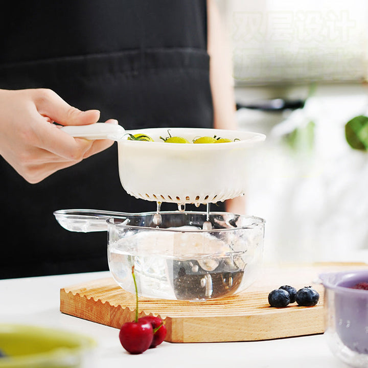 Kitchen strainer hanging by its integrated loop for easy storage