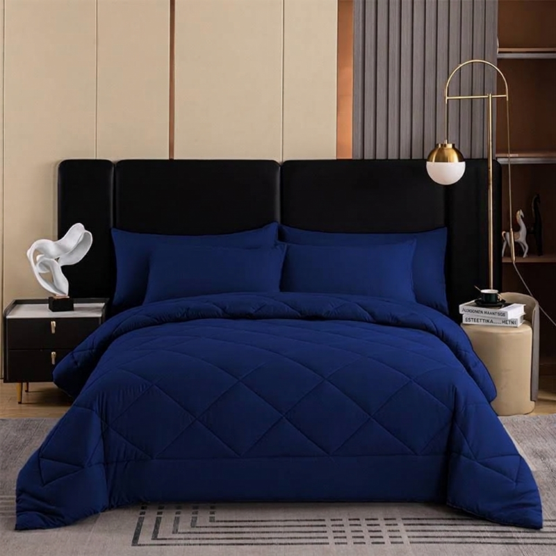 Soft microfiber bedspread set folded neatly showcasing textured quilted pattern