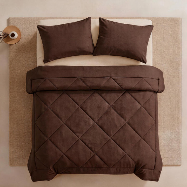 Cozy bedroom aesthetic featuring the soft quilted bedspread and shams
