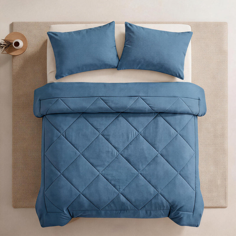 Lightweight bedspread styled smoothly across a modern queen size bed