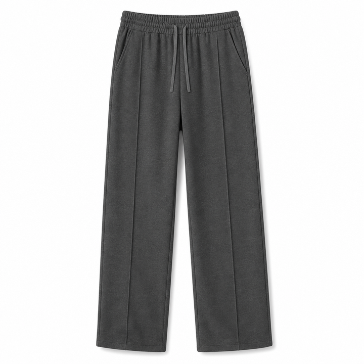 Flat lay of men's casual trousers folded neatly to show fabric quality