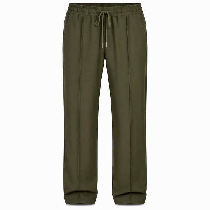 Model walking outdoors while wearing comfortable men's activewear pants