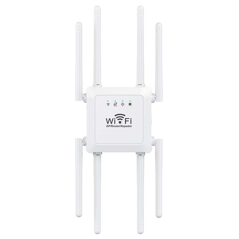 Wireless signal booster placed on a desk next to a laptop in a home office