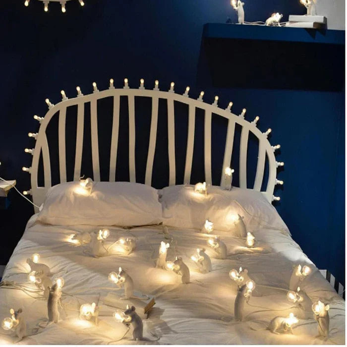 Whimsical mouse bedside lamp providing soft illumination for reading