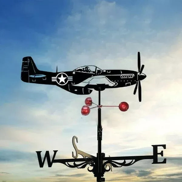 Stainless steel garden wind spinner featuring a Mustang aeroplane design against a blue sky