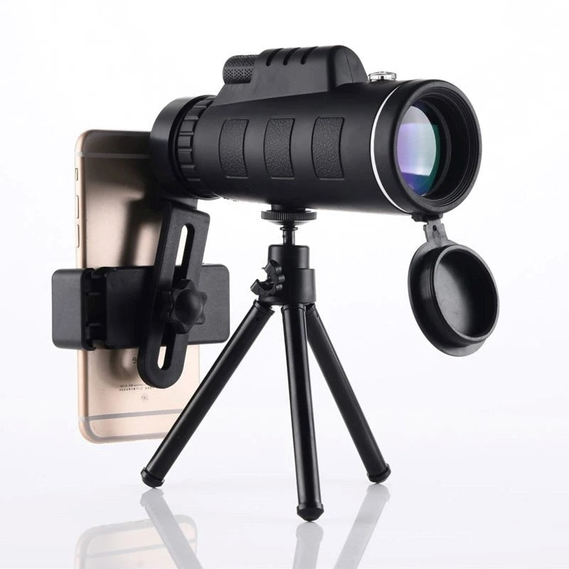 HD monocular telescope mounted on a tripod with a smartphone attached via phone clip