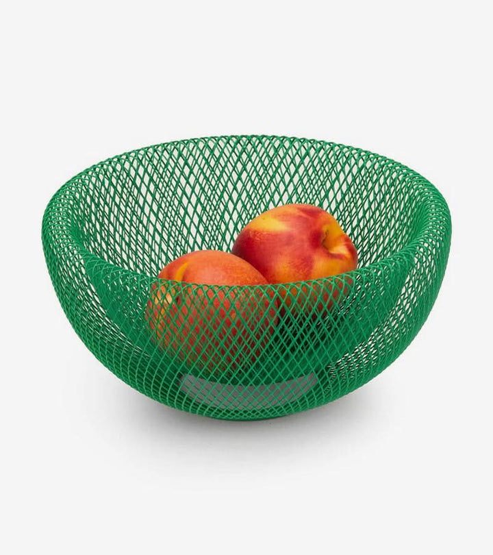 Stylish wire fruit basket serving as modern kitchen decor