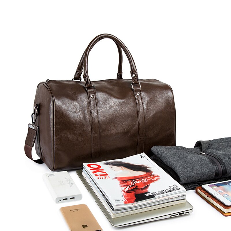 Travel accessories organizer pocket feature on front of duffel bag