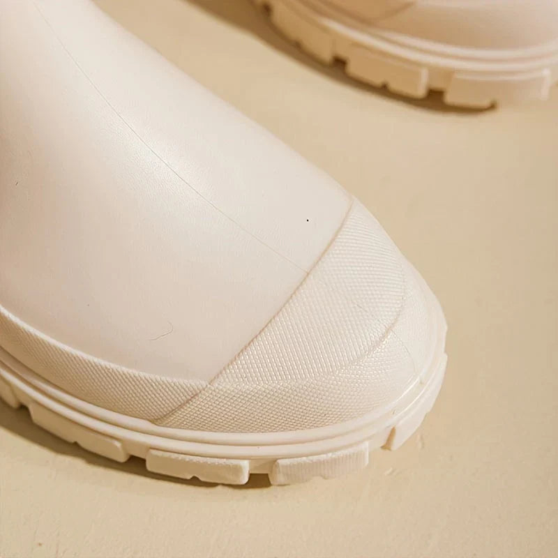 Close-up of non-slip rubber sole on women's all-weather rain boots