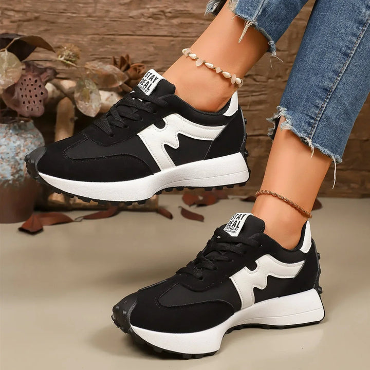 Detailed shot of platform sneaker tread and sole construction for women's fashion shoes