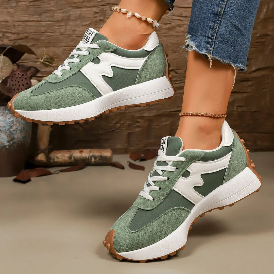 Pair of comfortable women's casual footwear displayed together on a neutral background
