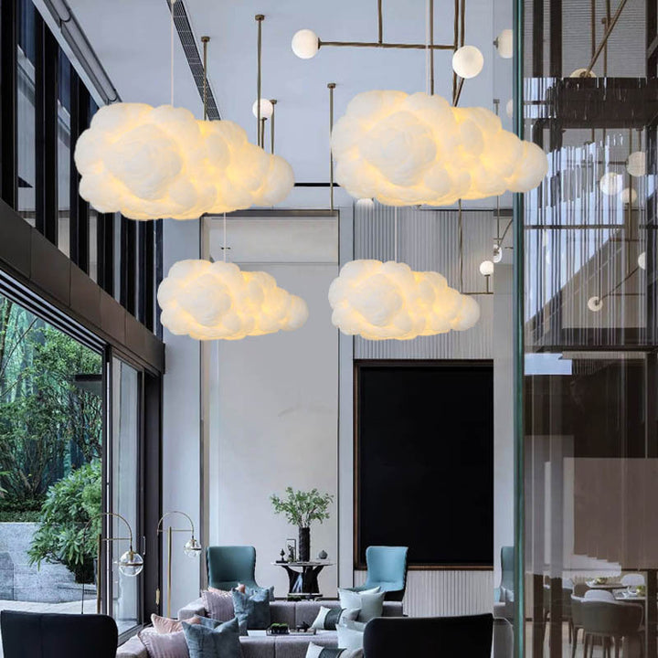 Modern white cloud ceiling lamp glowing softly in a cozy bedroom setting