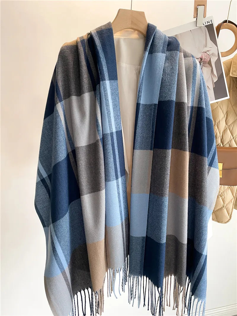 Close-up view of the warm checked winter scarf for women, highlighting fringe details and texture.