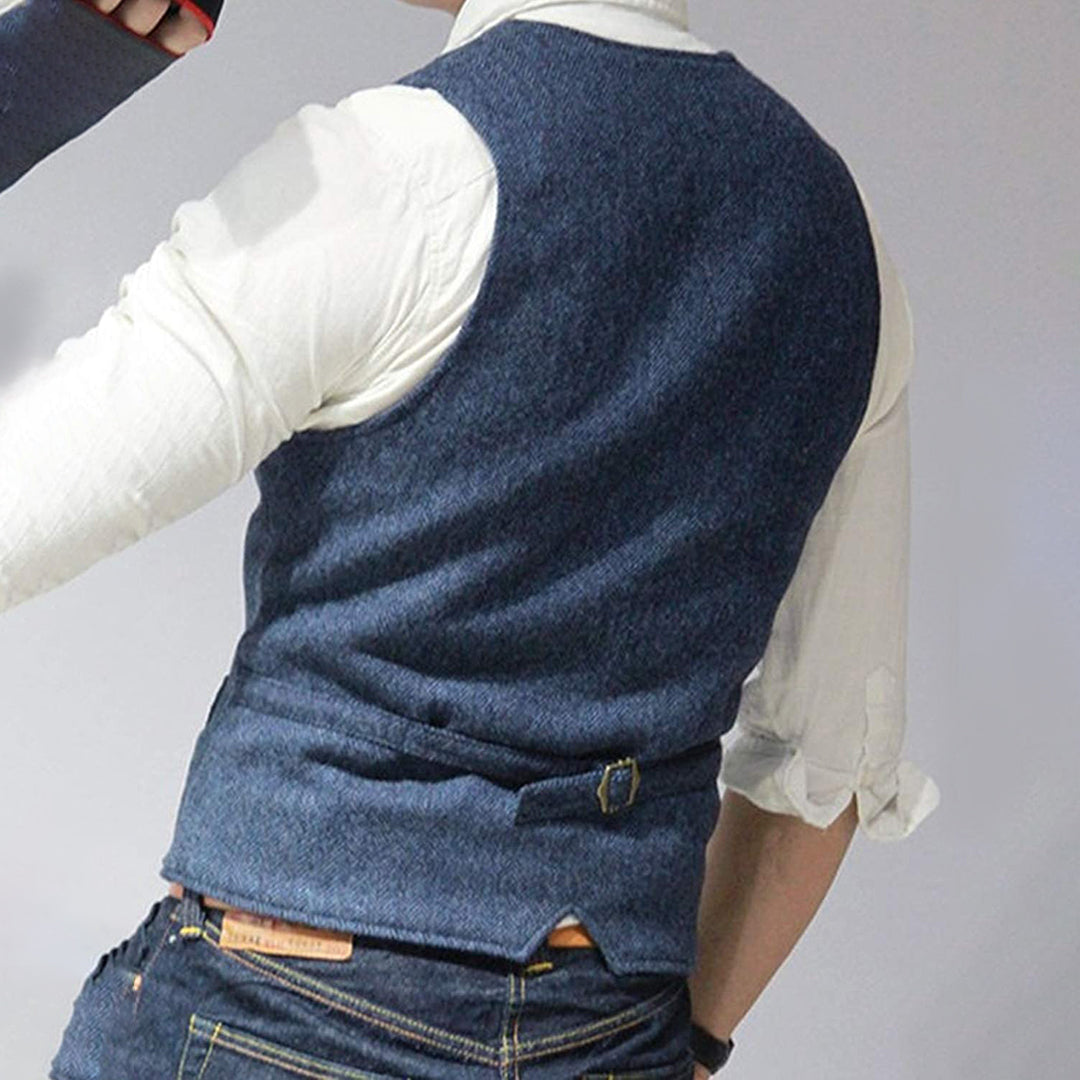 Back view of casual mens denim vest showcasing tailored fit and stitching