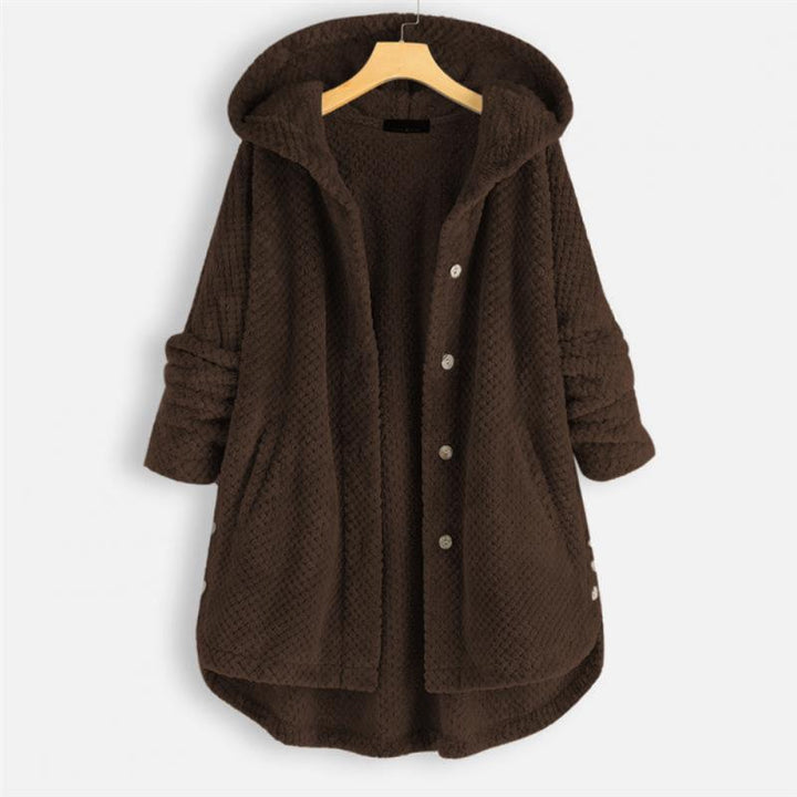 Side view of women's hooded fleece jacket showcasing cozy outerwear design