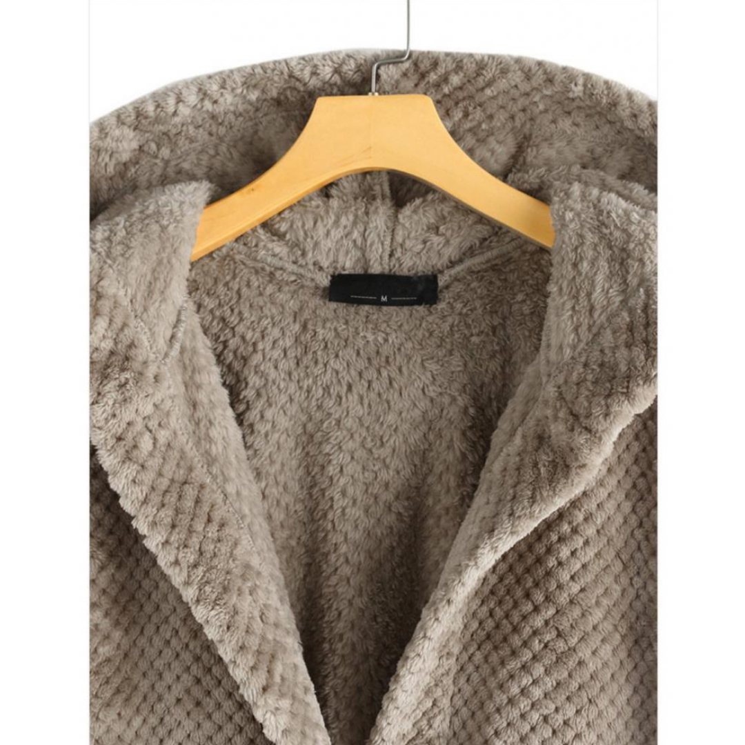 Sleeve cuff and pocket close-up of cozy winter fleece apparel