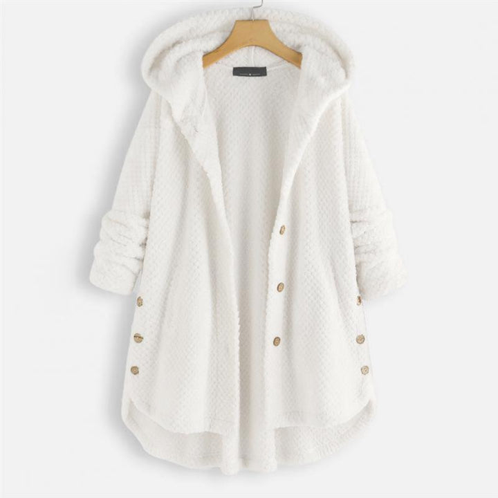White hooded fleece jacket hanging on a wooden hanger