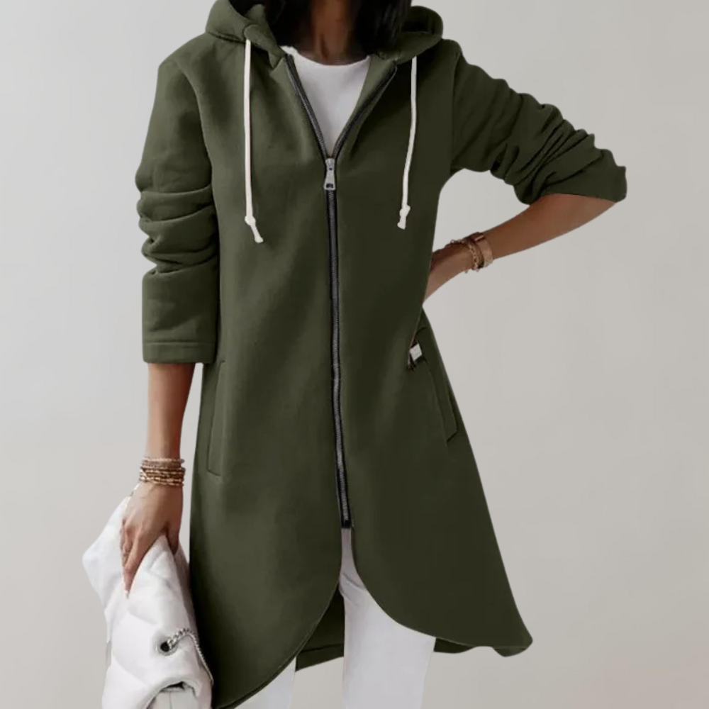 Woman wearing a green zip hooded cardigan with longline cut