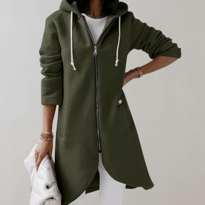 Woman wearing a green zip hooded cardigan with longline cut