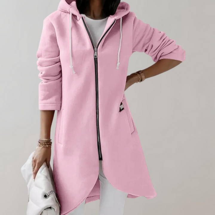 Woman wearing a pink zip hooded cardigan with adjustable drawstrings