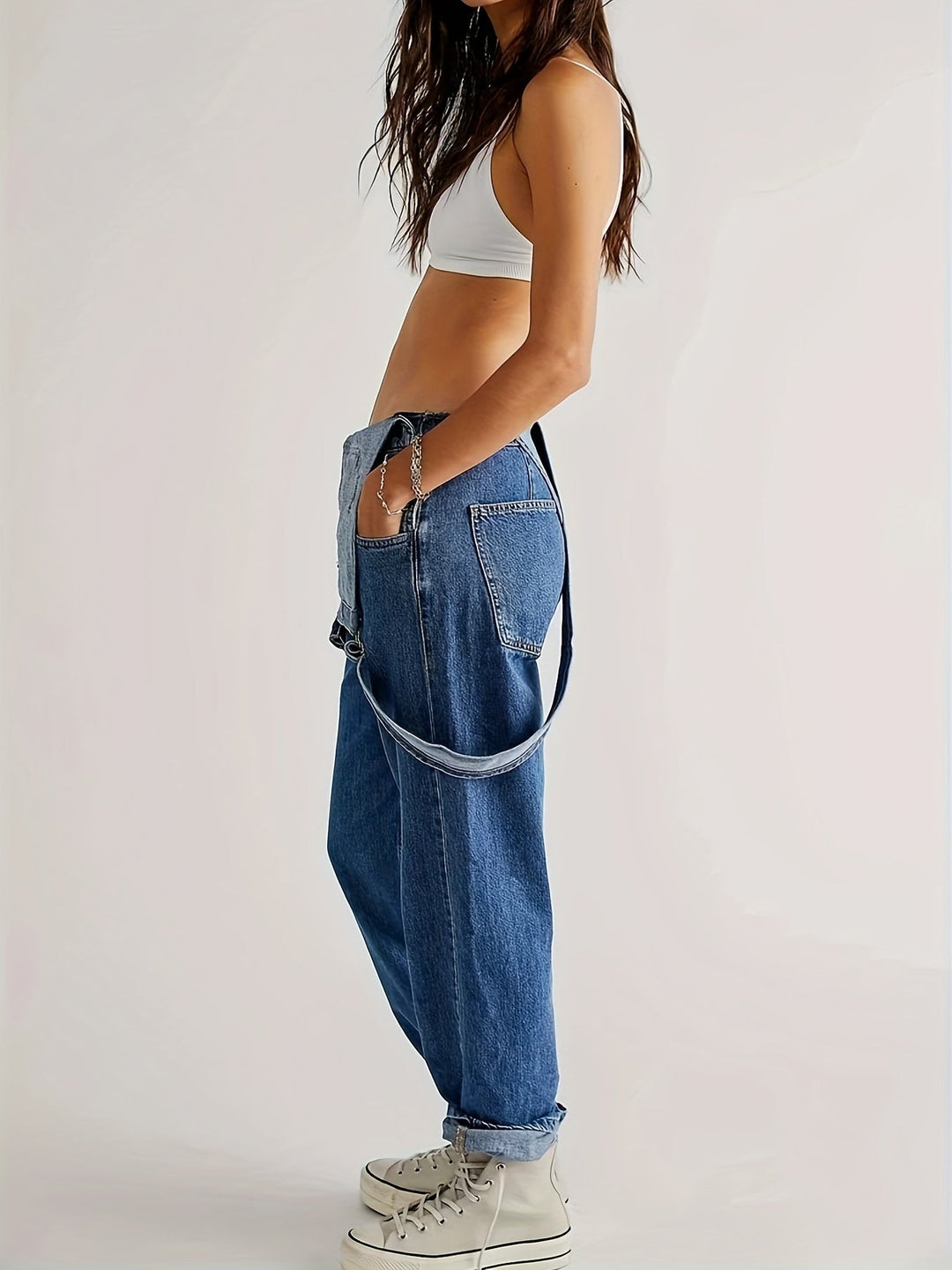 Detailed shot of utility pockets on trendy daily wear denim overall