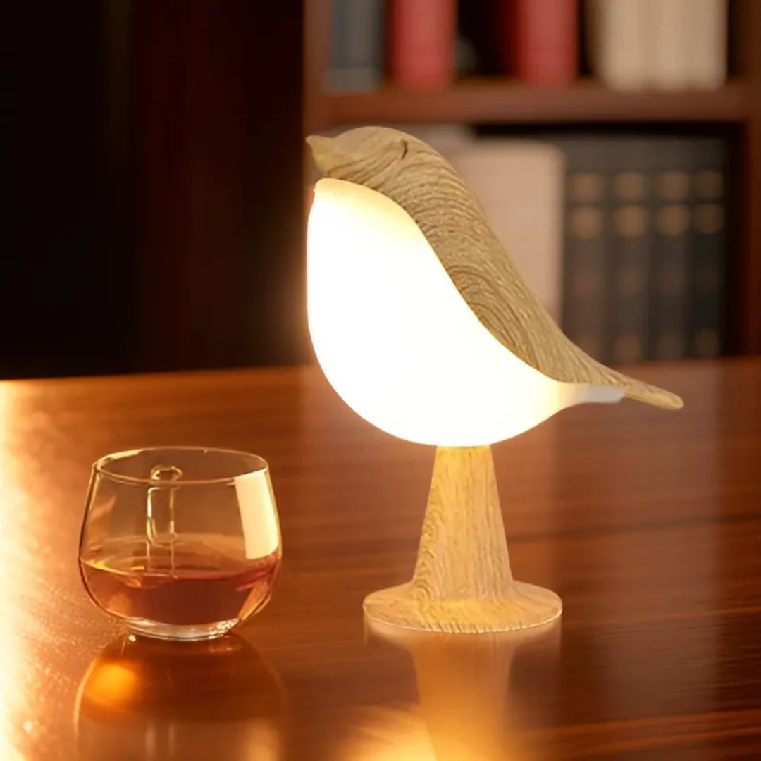 Stylish ambient bird lamp showcasing its sleek silhouette and warm glow