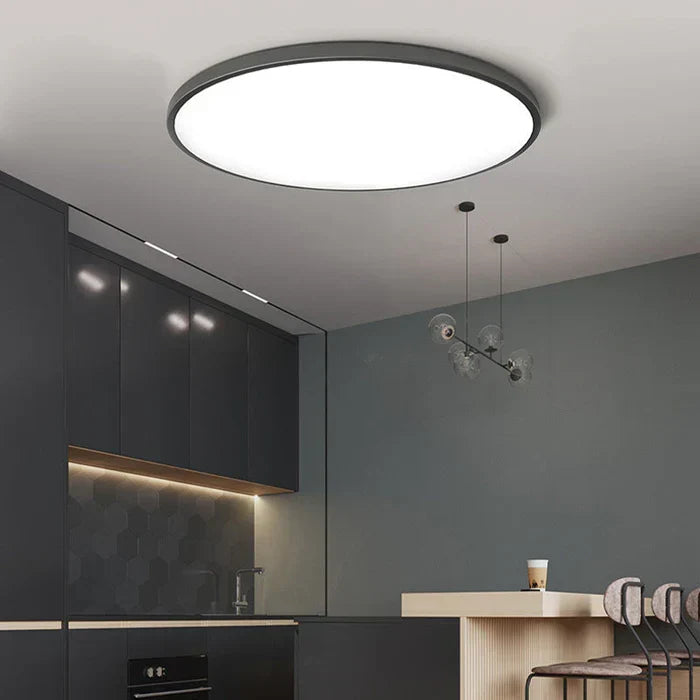 Modern LED ceiling light mounted on a white ceiling, highlighting home decor lighting.