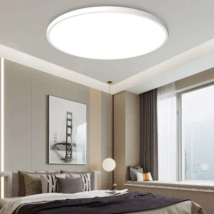 OrbGlow LED ceiling light installed in a modern bedroom