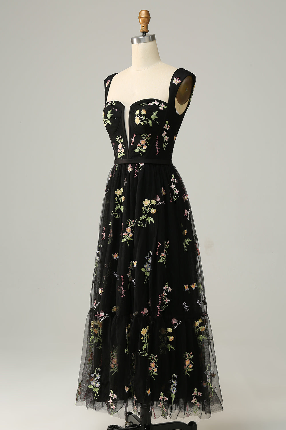 Angled view showcasing the flowing skirt of the A-line ball gown