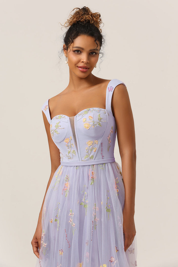 Full body shot of women's long embroidered A-line ball gown
