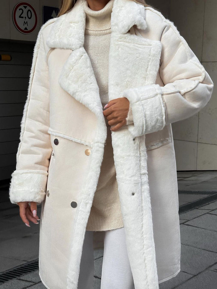 Close up view of the beige long fleece winter coat lapel and buttons