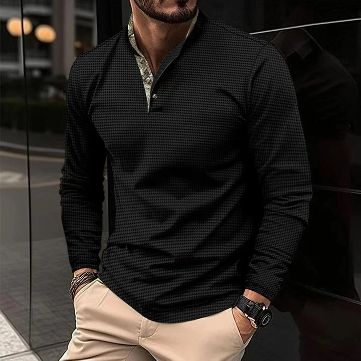 Detailed view of the collar and buttons on the Finn mens long sleeve polo shirt