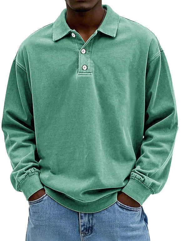 Man wearing green long-sleeved polo shirt with tailored fit