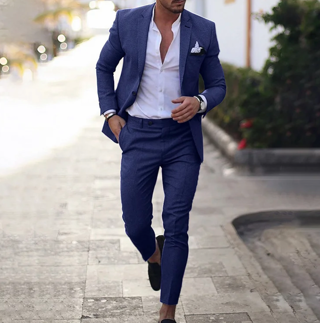 Man wearing dark blue business casual suit set with white shirt