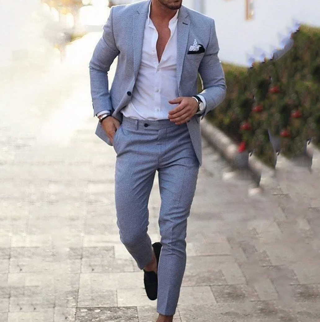 Man wearing grey business casual suit set outdoors