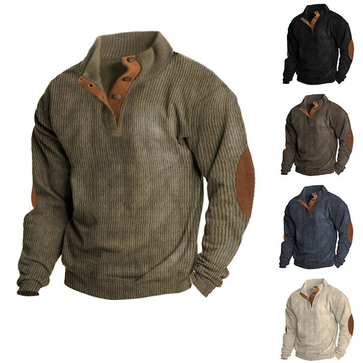 Flat lay of mens thermal knit pullover sweater with outdoor gear