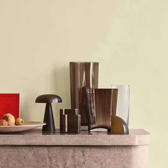 Modern portable desk lamp showcased in a warm interior setting
