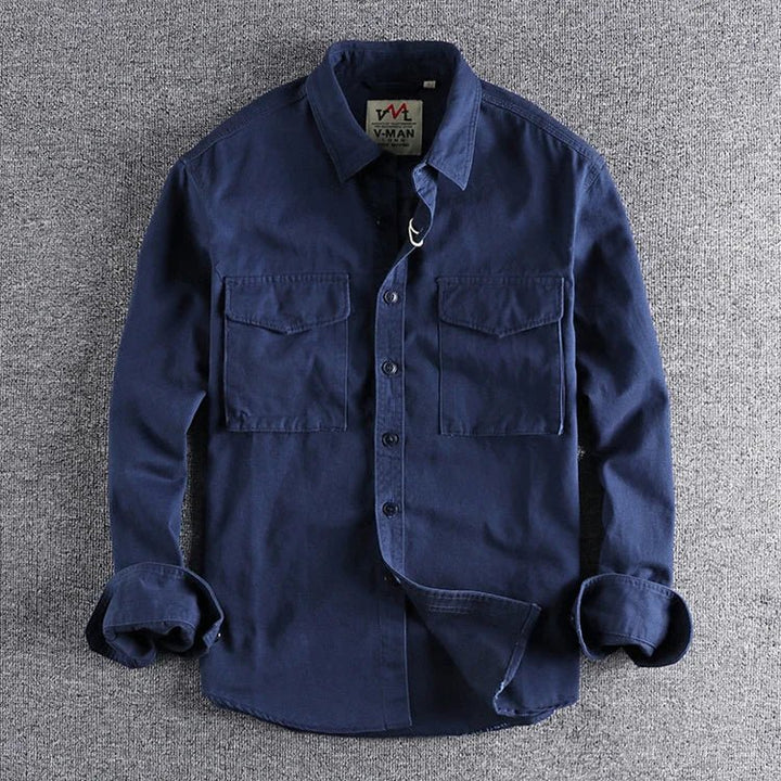 Marine blue men's casual utility shirt featuring button closure