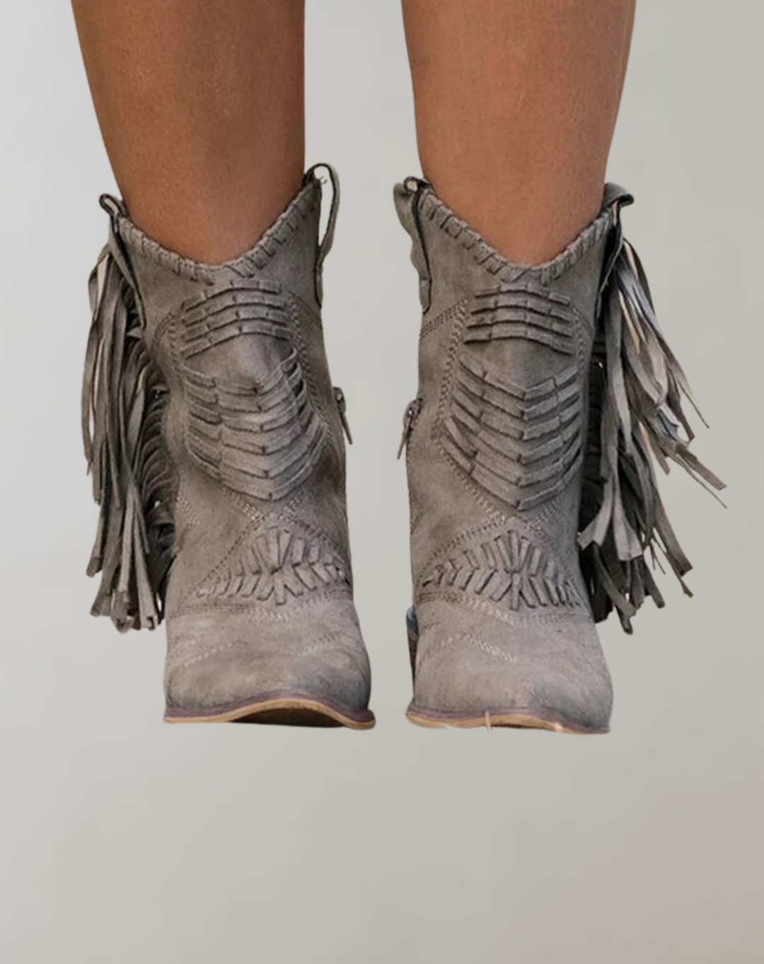 Front view of grey women's tassel ankle boots