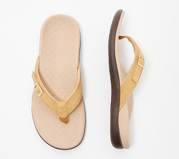 Side profile of comfortable summer footwear for women featuring arch support