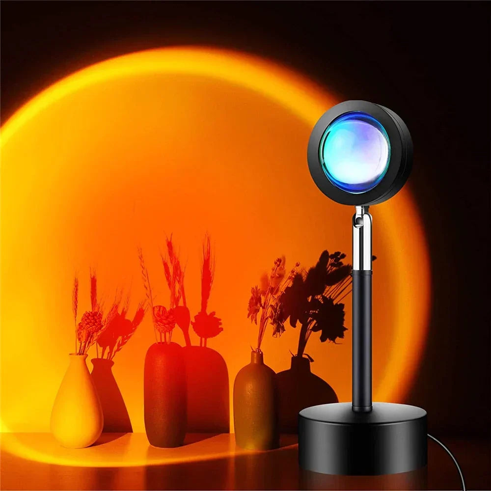 GlowSphere sunset lamp projecting warm orange light onto a wall