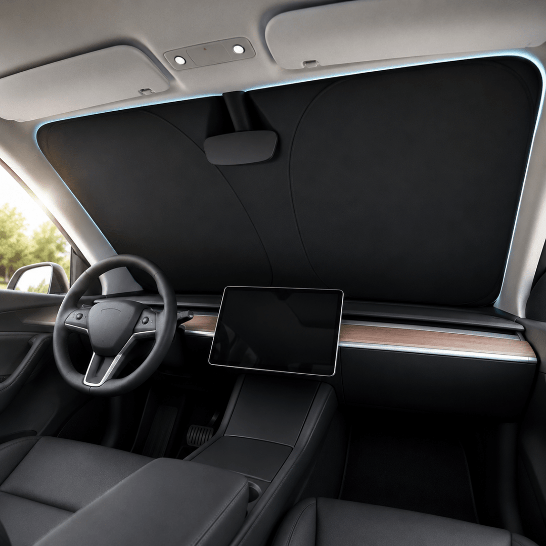 Black car windshield sunshade installed inside vehicle interior