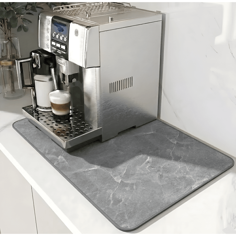 Complete kitchen countertop setup featuring absorbent coffee mat