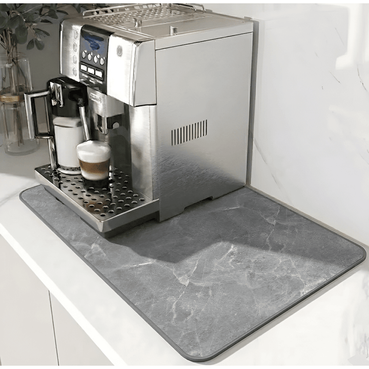Complete kitchen countertop setup featuring absorbent coffee mat
