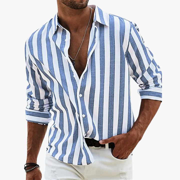 Man wearing blue and white striped long-sleeve button-down shirt