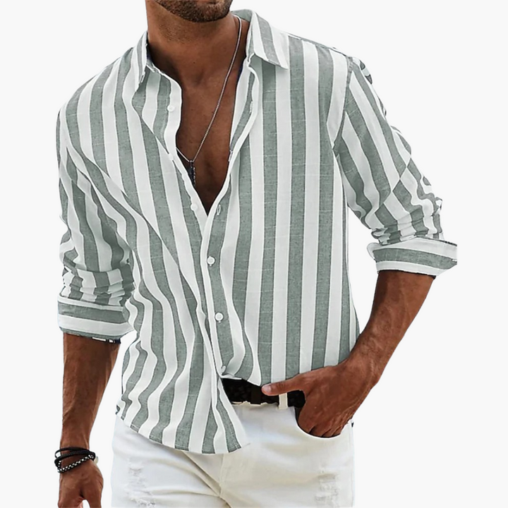 Man wearing grey and white striped long-sleeve button-down shirt