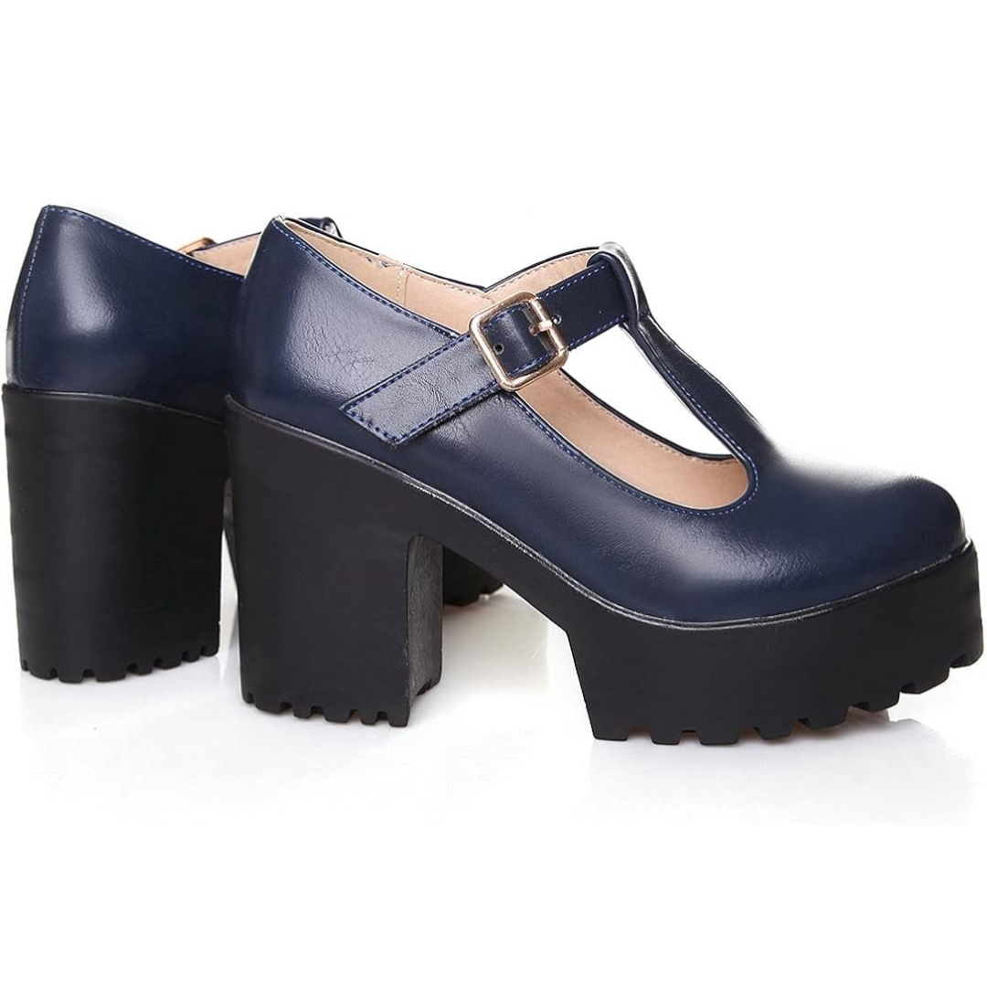 Pair of black mary jane chunky heels displayed on a minimalist surface
