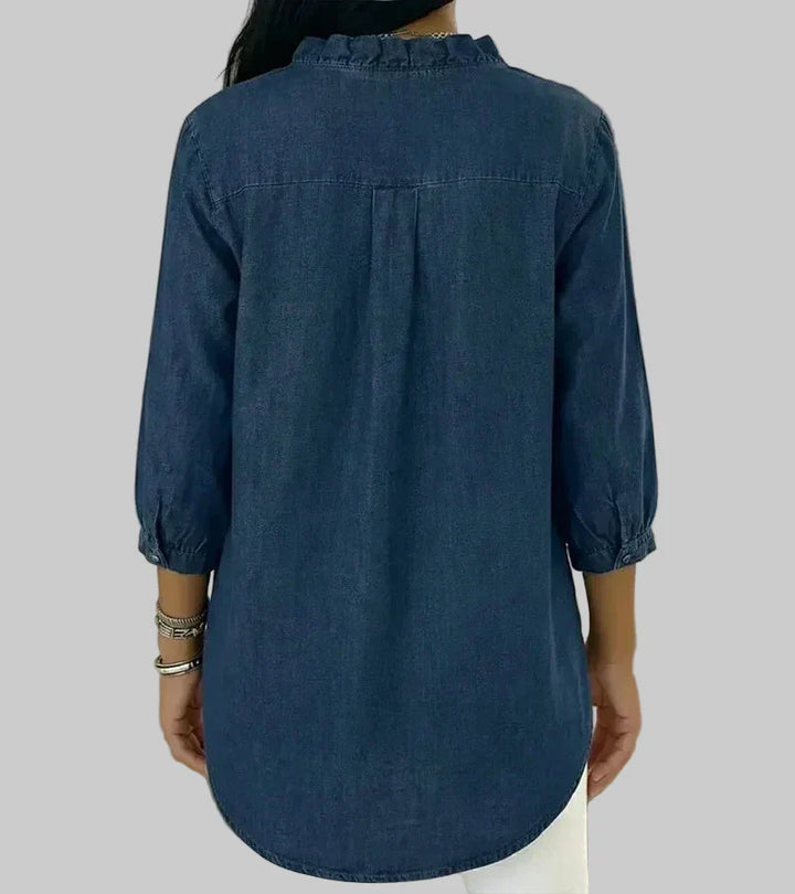 Women's V-neck ruffle blouse showing the chic button-down front design