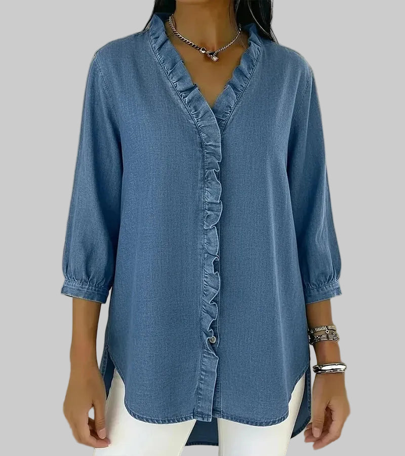 Detailed shot of the ruffle trim on the V-neck women's fashion blouse