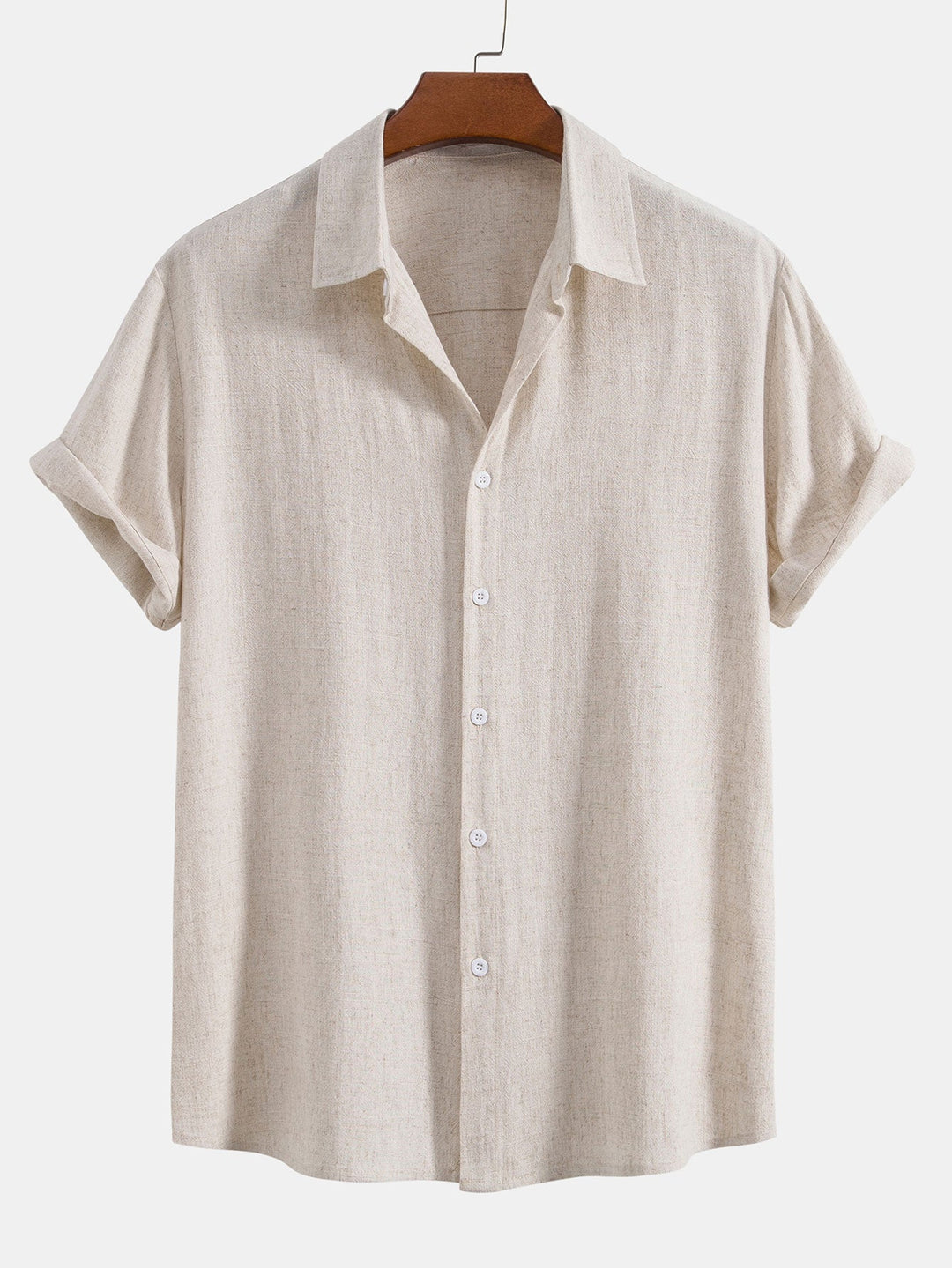 Beige short sleeve button-down shirt displaying open collar and texture